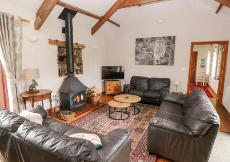 The living room at The Barn at Harrolds Farm, Redberth