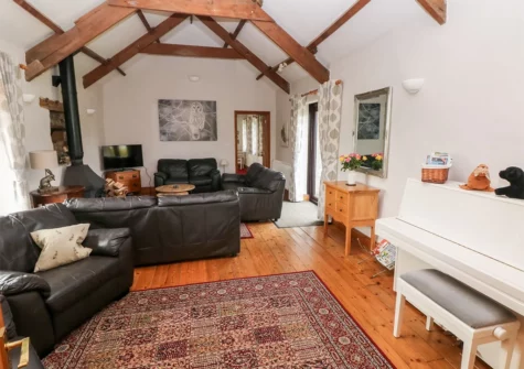The living room at The Barn at Harrolds Farm, Redberth