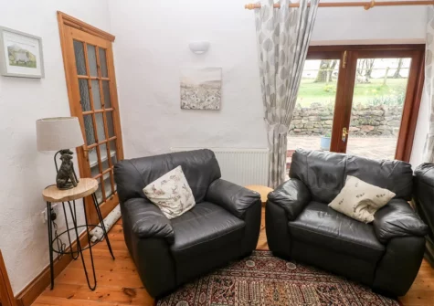 The living room at The Barn at Harrolds Farm, Redberth