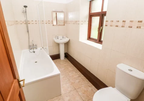 The bathroom at The Barn at Harrolds Farm, Redberth