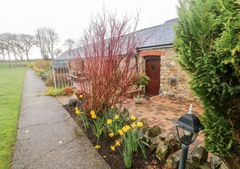 The front patio at The Barn at Harrolds Farm, Redberth