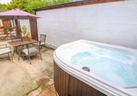 The hot tub at The Barn at Waunlippa, Llan-mill