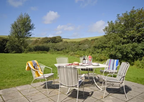 The patio, alfresco dining area & garden at The Burgage, Nolton Haven