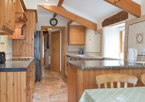The kitchen & breakfast area at The Byre, Lyserry Barns, St Twynnells