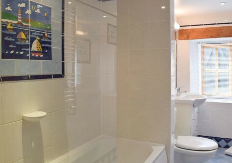 The bathroom at The Byre, Lyserry Barns, St Twynnells