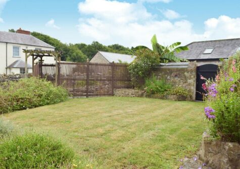 The well manicured garden at The Byre, Lyserry Barns, St Twynnells