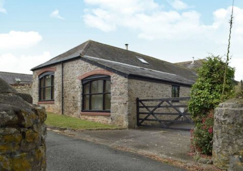 The Byre, Lyserry Barns, St Twynnells is a sympathetically converted barn adjoining the Stackpole Estate with three bedrooms & two bathrooms. Spacious living room with woodburner & garden views through French doors. Well located for coastal walks.