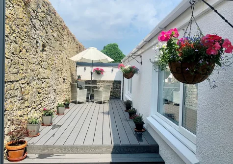 The decked patio & alfresco dining area at The Edge, Tenby