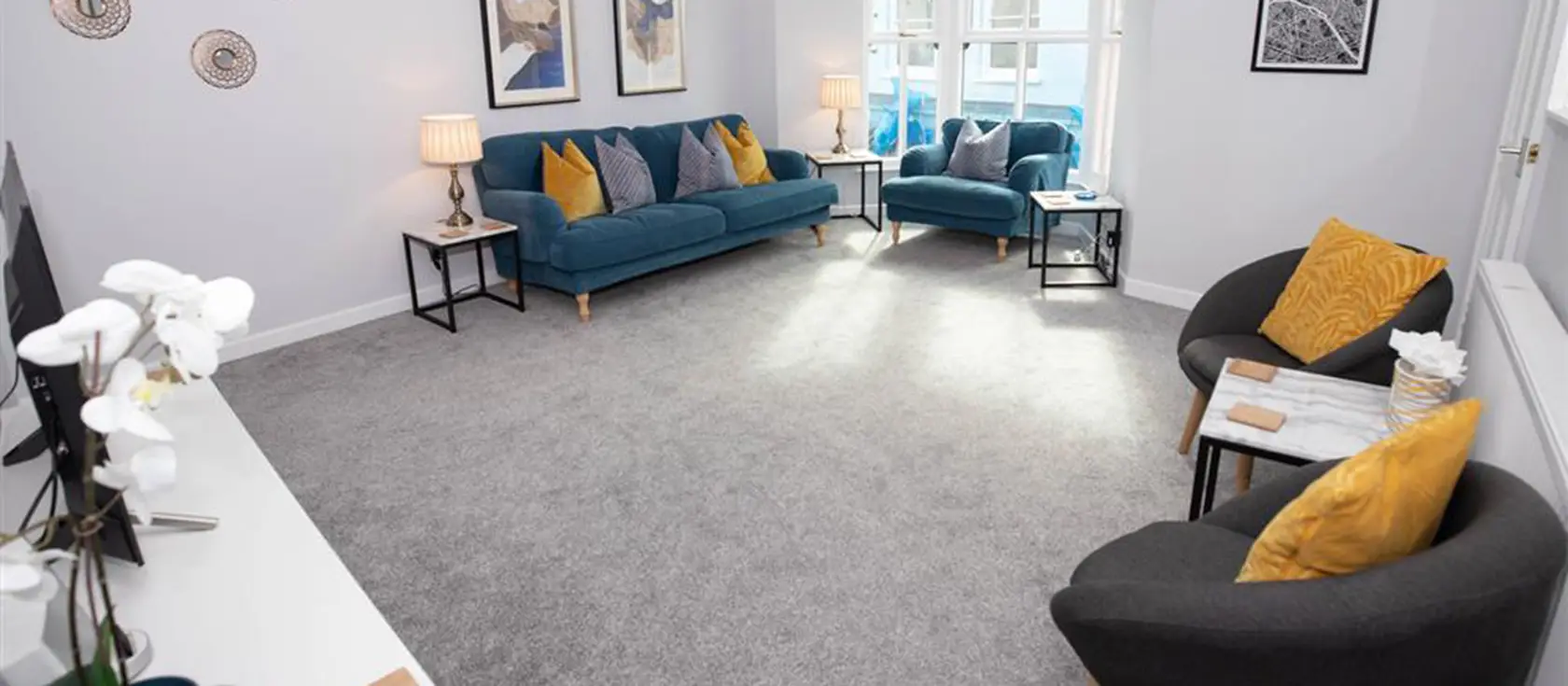 The Edge, Tenby is a stylish apartment within historic town walls offering contemporary living spaces, two comfortable bedrooms, and a small decked patio. Perfectly positioned for exploring beaches, shops, and attractions from your coastal retreat.