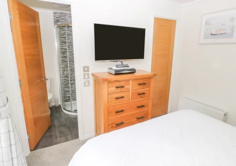 Bedroom #1 & en-suite at The Lookout, Heritage Park, Stepaside