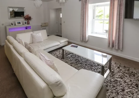 The living room at The Old Farm House, Redberth