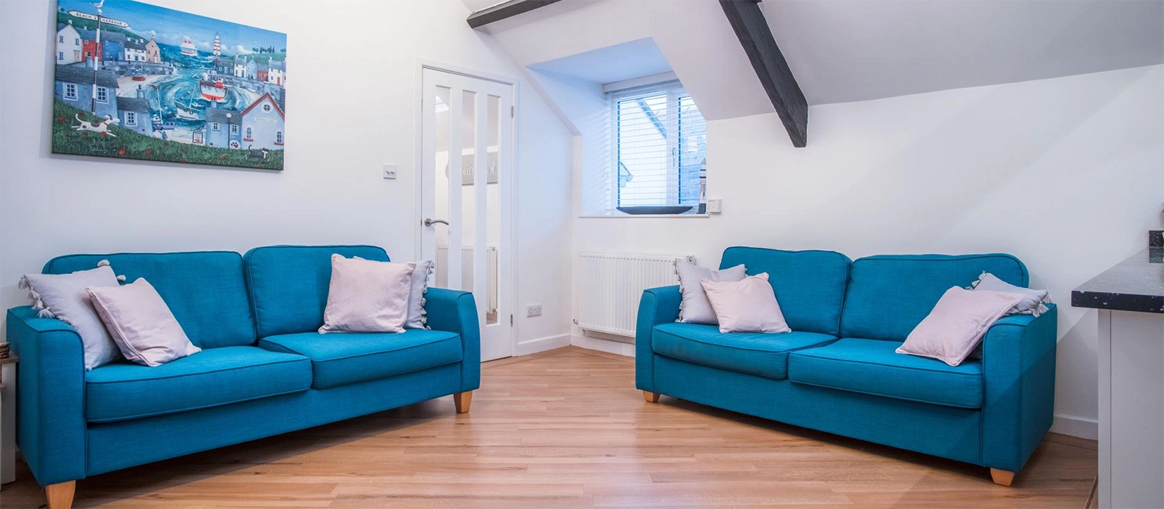 The Penthouse sits above The Mews, a fantastic collection of eateries in the heart of Tenby. This top-floor flat is finished to a high standard and features a spacious open-plan living area and two bedrooms - one king-size and one with bunk beds.