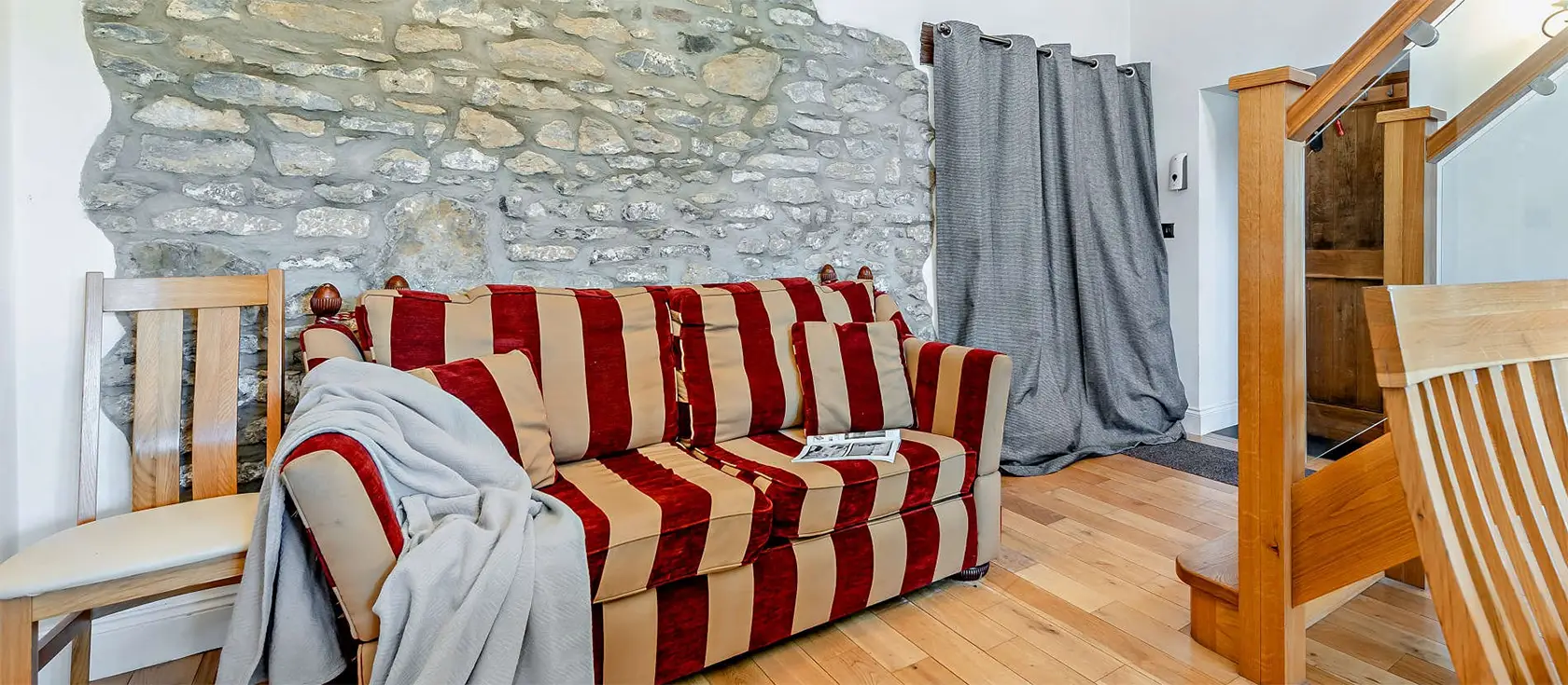 The Shippon At Brynbanc, Lampeter Velfrey is a charming 2-bedroom barn conversion with a galleried living space, situated on the owner's farm in Pembrokeshire countryside. It's located a short distance from major attractions and the historic castle.