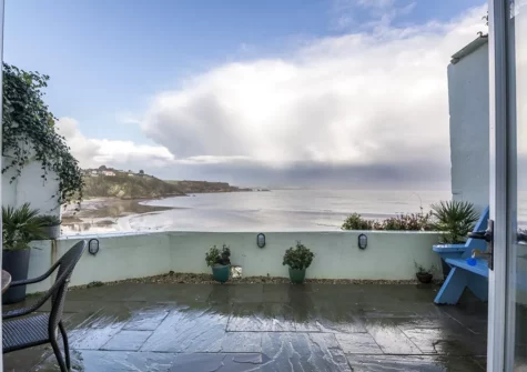 The Sweetness of Water's private patio has breathtaking views of the harbour & beyond