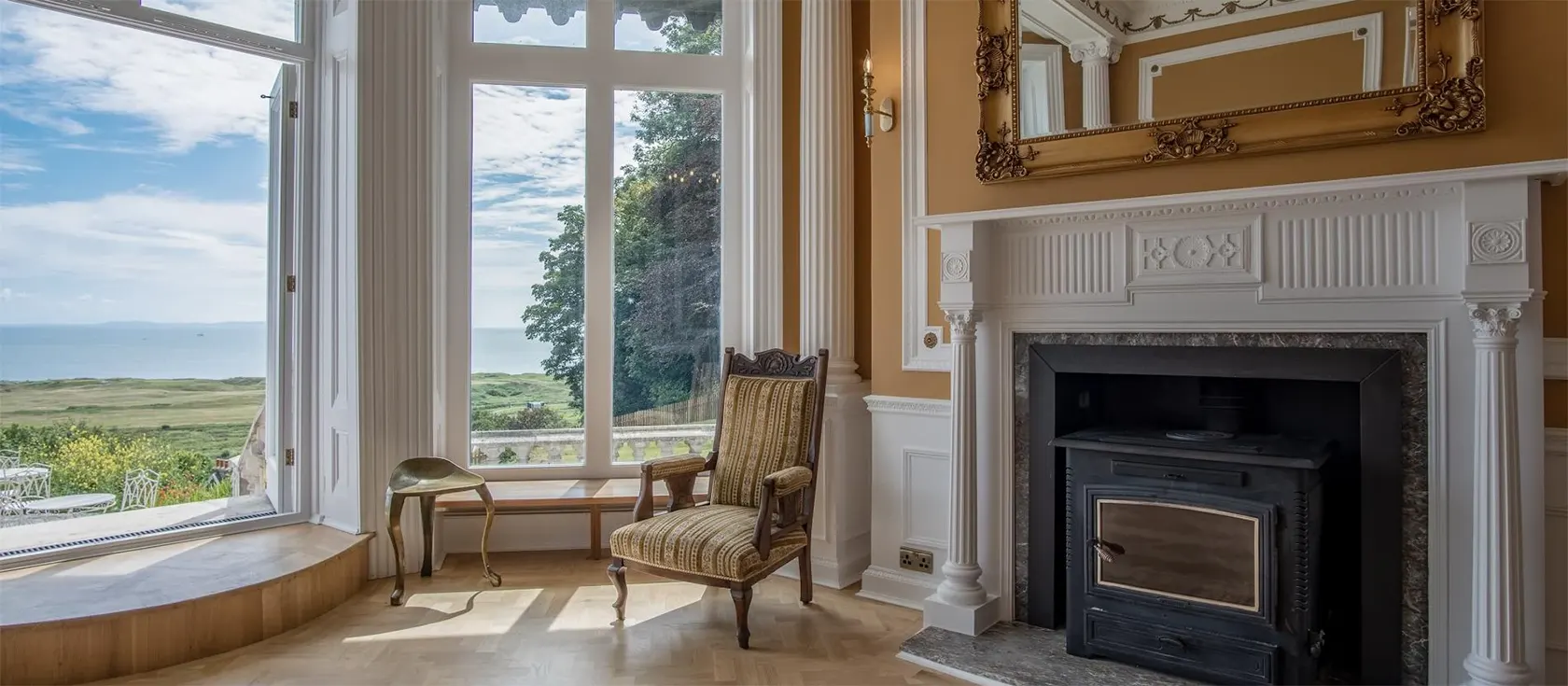 To The Manor Born is a large, fantastically luxurious property in Penally. The Grade II listed building sleeps 25 people in 14 bedrooms, it has a swimming pool, private bar, library, games room, vast grounds and stunning rural and coastal views.