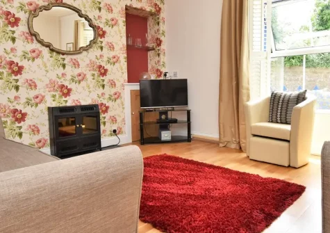 Ty Carreg, Tenby is a charming dog-friendly cottage with three comfortable bedrooms, an enclosed garden with BBQ & all modern amenities. Just 200 metres from beaches, shops and restaurants, it's perfect for families seeking a Welsh coastal escape.