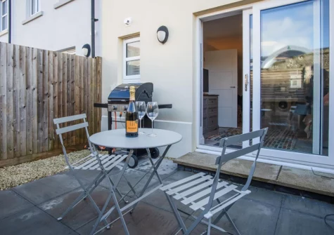 The enclosed garden & barbecue area at Ty Melyn, Tenby