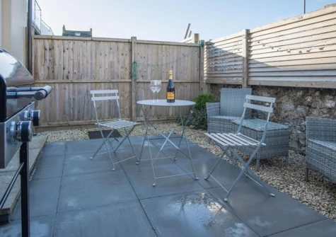 The enclosed garden & barbecue area at Ty Melyn, Tenby