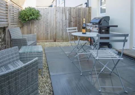 The enclosed garden & barbecue area at Ty Melyn, Tenby
