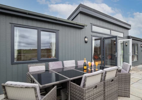 The patio & alfresco dining area at Valley View Lodge, Penally Grange, Tenby