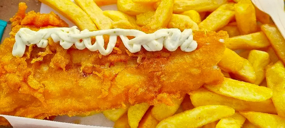 Small Fry's shiny silver food truck parks up at the main beach entrance and serves up fancy fish and chips right on the sand.