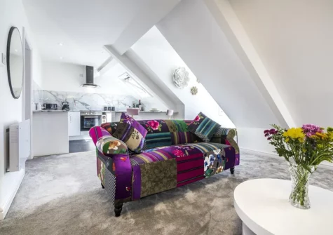 The living area at Watching The Waves, Tenby