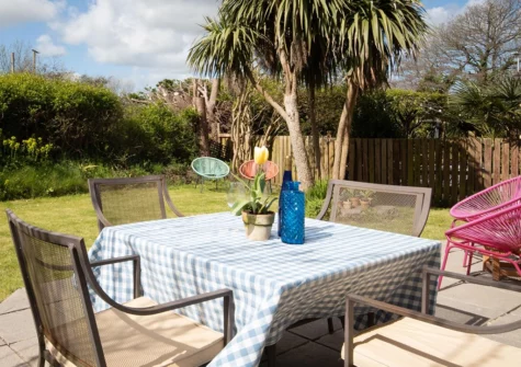 The alfresco dining area & garden at Woodfield House, Tenby