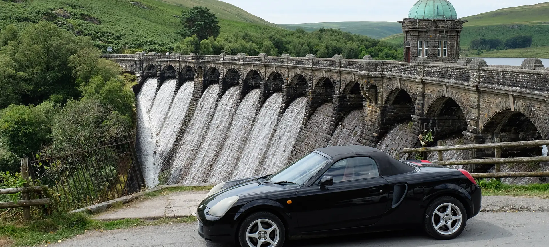 Craig Goch is the highest upstream of the series of dams in the Elan Valley - located at a height of 1,040 feet (317 metres) above sea level. Craig Goch is seen by many as the most attractive of the dams, with an elegantly curved retaining wall and a series of arches carrying a narrow roadway across the top of the dam. It has a domed valve tower and the structure is typical of the 'Birmingham Baroque' style of much of the waterworks scheme.