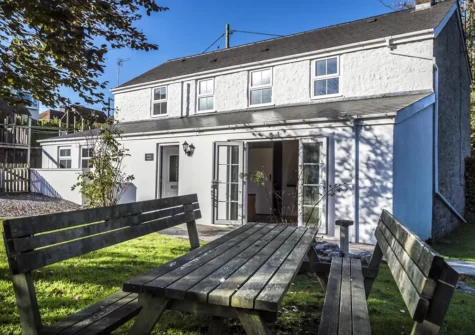 Enjoy alfresco dining in the garden at Writing History, Tenby